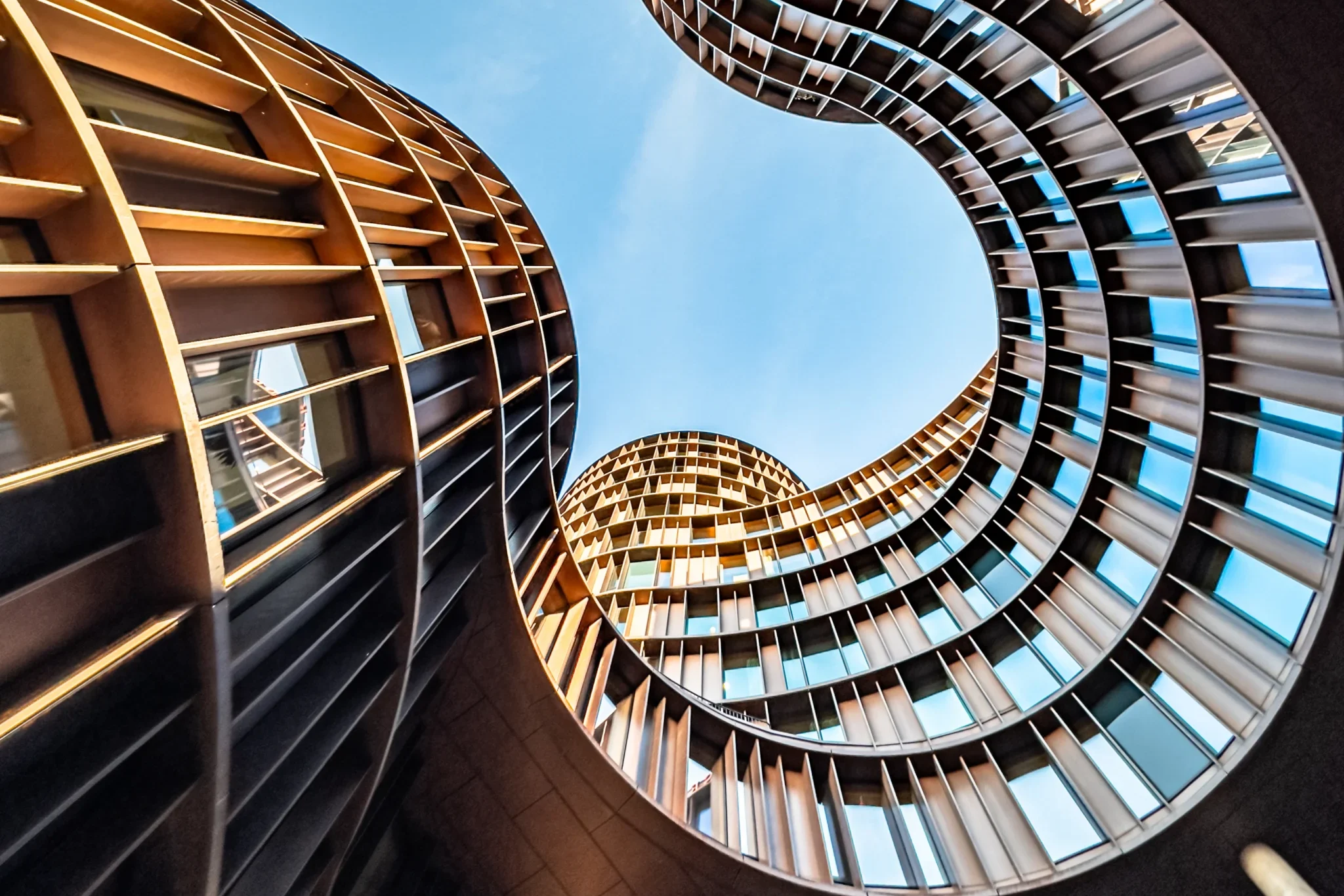 low-angle-of-axel-towers-an-iconic-mixed-use-offi-2024-02-20-00-11-12-utc-scaled-e1729677707858.webp